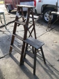 Group of two wooden step ladders