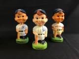 Group of three vintage New York Yankees and Boston Red Sox porcelain bobble heads