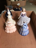 Group of four Coalport Victorian women figurines