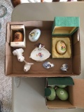 Group of porcelain figurines and eggs
