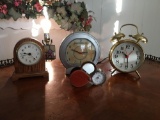 Group of 4 clocks