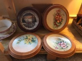 Group of four framed plates
