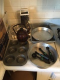 Group of kitchen baking pans and more