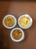 Group of 3 sterling silver gold plated rounds
