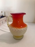 Vintage Amberina hobnail cased glass pitcher with applied handle