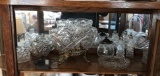 Shelf lot of clear pressed glass items
