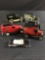 Group of four diecast truck advertising coin banks and small diecast Bonneville