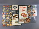 Group of vintage advertising cigar labels and signs