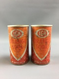 Group of 2 vintage IGA orange soda cans