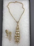 Gold tone rhinestone statement necklace with earrings