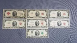 lot of seven $2 legal tender and Federal Reserve notes
