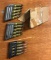 Group of three World War II era stripper clips with ammunition