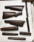 Group of antique rifle stocks and parts