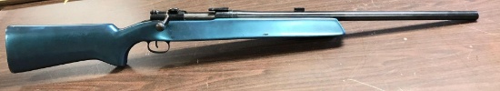 Custom made 30 caliber bolt action rifle