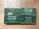 Group of four Remington 219 zipper and 30-30 Winchester boxes with casings