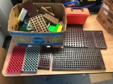 Large group of loading trays and cases