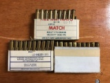 Group of two full and one partially full box of 30 caliber ammunition