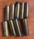 Group of nine antique brass shotgun casings