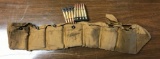 Vintage military ammo pouch with 303 British ammunition on stripper clips