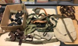 Group of fire arm straps, bag, and more