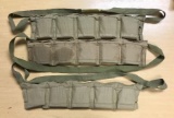 Group of three vintage military ammo pouches with 303 caliber ammunition on stripper clips