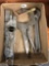 Group of metal clamp, crescent wrench, 2 strikers ,2 tip cleaners and a torch tip