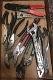 Lot of wire strippers needle nose pliers channel locks adjustable wrenches and slip joint pliers