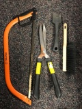 Group of pruning tools and brush