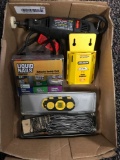 One Dremel Moto tool , liquid nails, Nearly full Stanley play dispenser, magnetic level