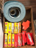 Group of spark plugs and aluminum oxide 120 sandpaper