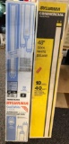 Two packs of fluorescent lightbulbs