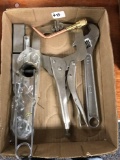 Group of metal clamp, crescent wrench, 2 strikers ,2 tip cleaners and a torch tip