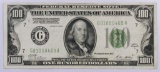 1928 A $100 Federal Reserve Note.