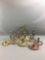 Group of 13 vintage candlestick holders
