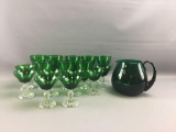Group of 17 vintage green glass pitcher and glasses