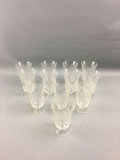 Group of 12 pressed glass glasses
