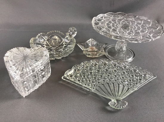 Group of Clear glass cake stand, candle holder and more