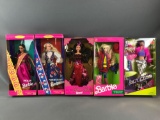 Group of Barbies in original boxes