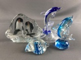 Group of glass dolphin figures and others