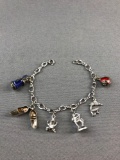 Sterling bracelet and 6 charms