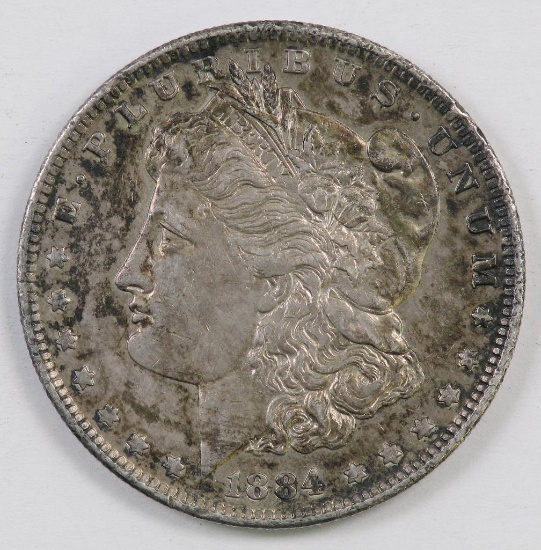 1884 O Morgan Silver Dollar.