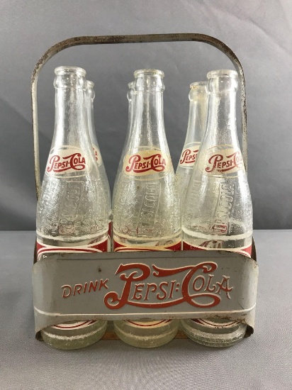 Vintage Pepsi Bottles in metal carrier