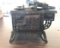 Vintage cast-iron clean stove coin bank