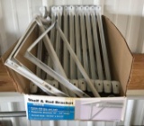 Group of 13 white shelf and rod brackets