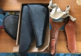 Group of pistol cases and shoulder holster