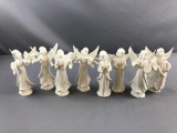 Group of 8 Dresden porcelain angels