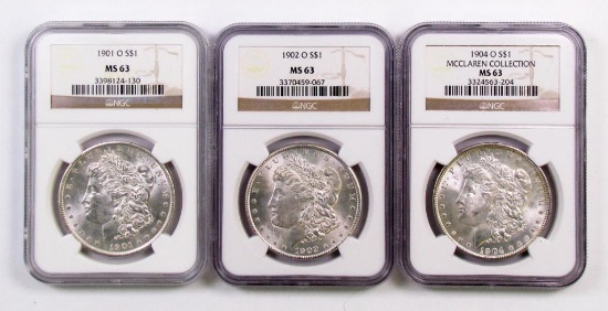 Lot of (3) Morgan Silver Dollars all (NGC) MS63.