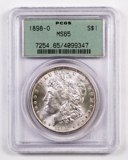 1898 O Morgan Silver Dollar (PCGS) MS65.