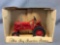 ERTL die cast McCormick Deering Farmall Tractor in original packaging