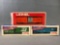 Group of 3 Lionel train cars in original packaging